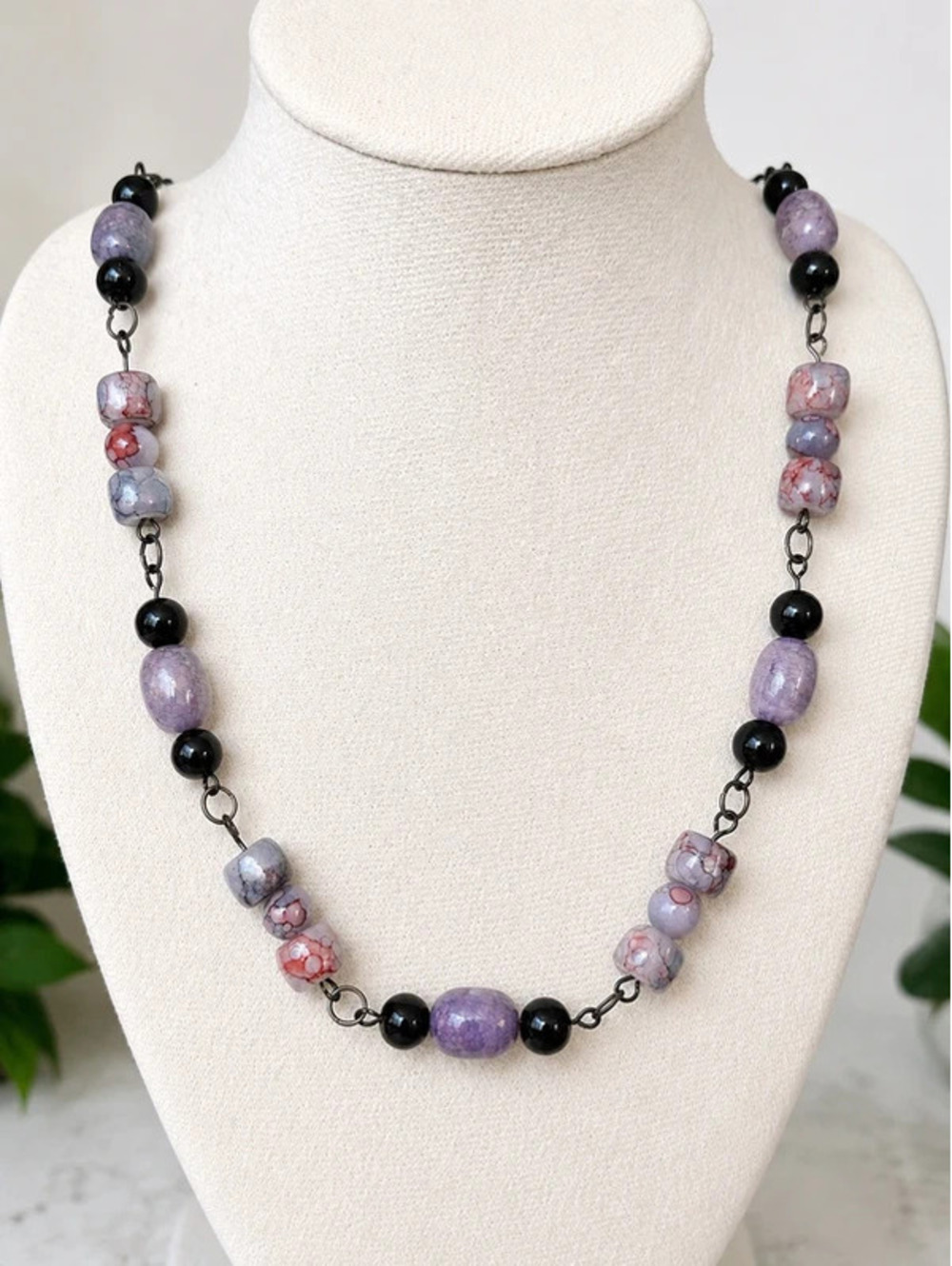 Handmade Purple and Black Beaded Necklace with Unique Stone Beads